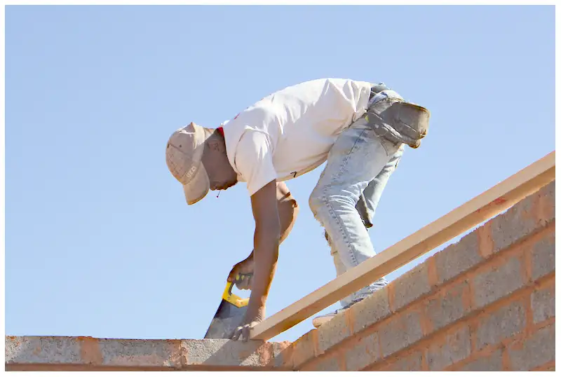 Commercial Photography, Carpenter on roof