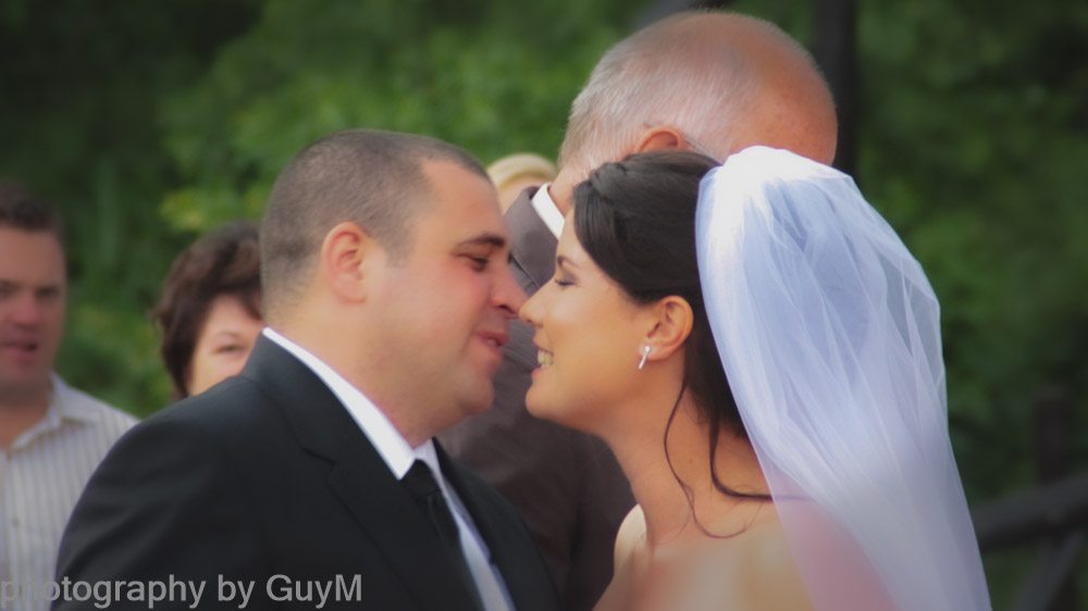 Bride and Groom kiss